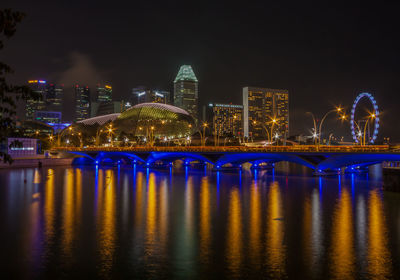 Illuminated buildings at waterfront