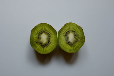 Close-up of bananas against white background