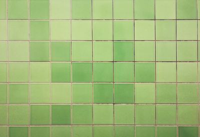 Full frame shot of green tiled wall