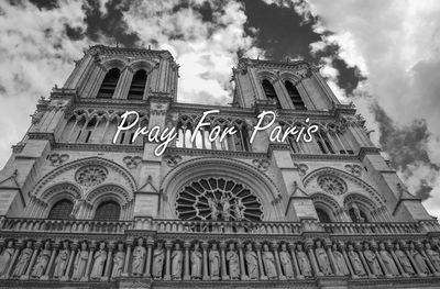 Low angle view of church against cloudy sky