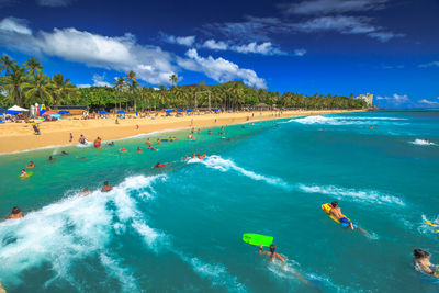 People enjoying at beach