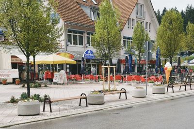 Street by buildings in city