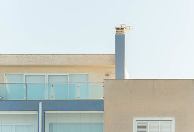 Low angle view of building against clear sky