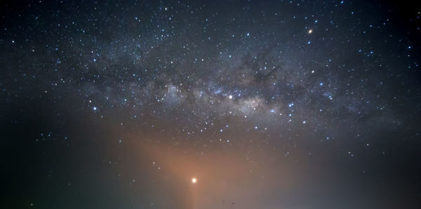 Low angle view of stars against sky at night