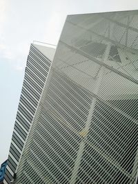 Low angle view of modern building against sky