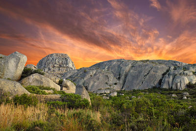 Scenic view of landscape against sky during sunset