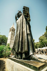 Low angle view of statue against clear sky