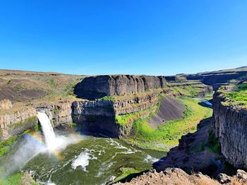 Scenic view of palouse waterfall against clear blue sky in washington state in usa 