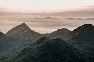 Scenic view of mountains against sky during sunset