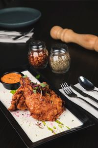 High angle view of meat in plate on table