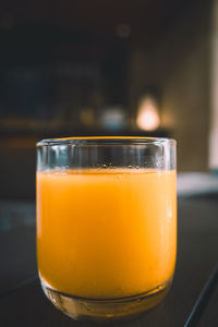 Close-up of orange juice in glass