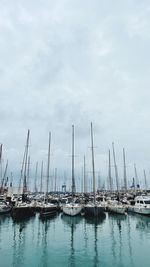 Boats moored at harbor in port de castellon, spain