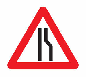 Close-up of road sign against white background