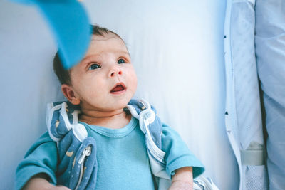 Portrait of cute boy looking away