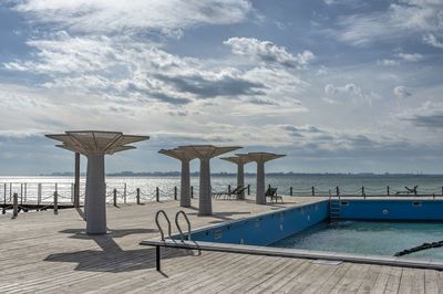 Recreation area with a swimming pool on the beach on the black sea 