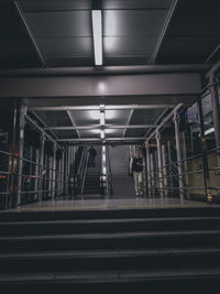 People waiting at railroad station platform