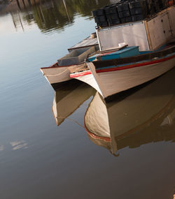 High angle view of boat moored in lake