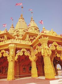 Low angle view of temple against building