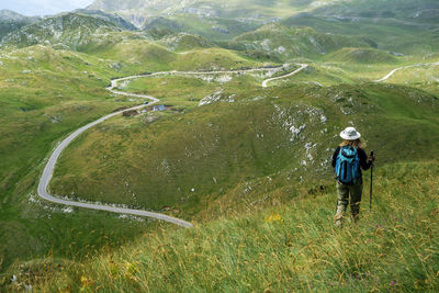 High angle view of woman standing on land