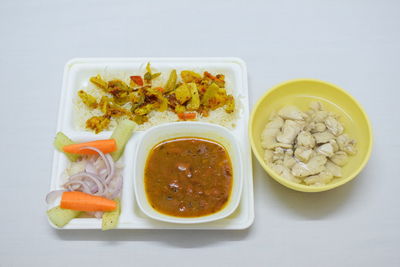 Close-up of food in bowl against white background