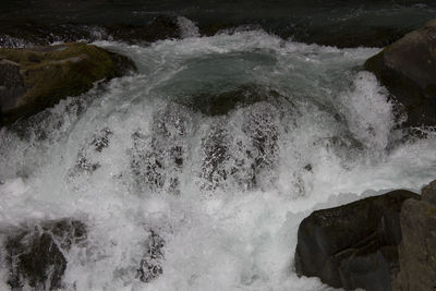 Waves splashing on rocks