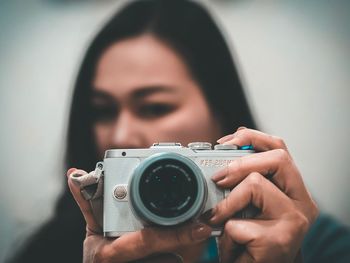 Portrait of woman photographing