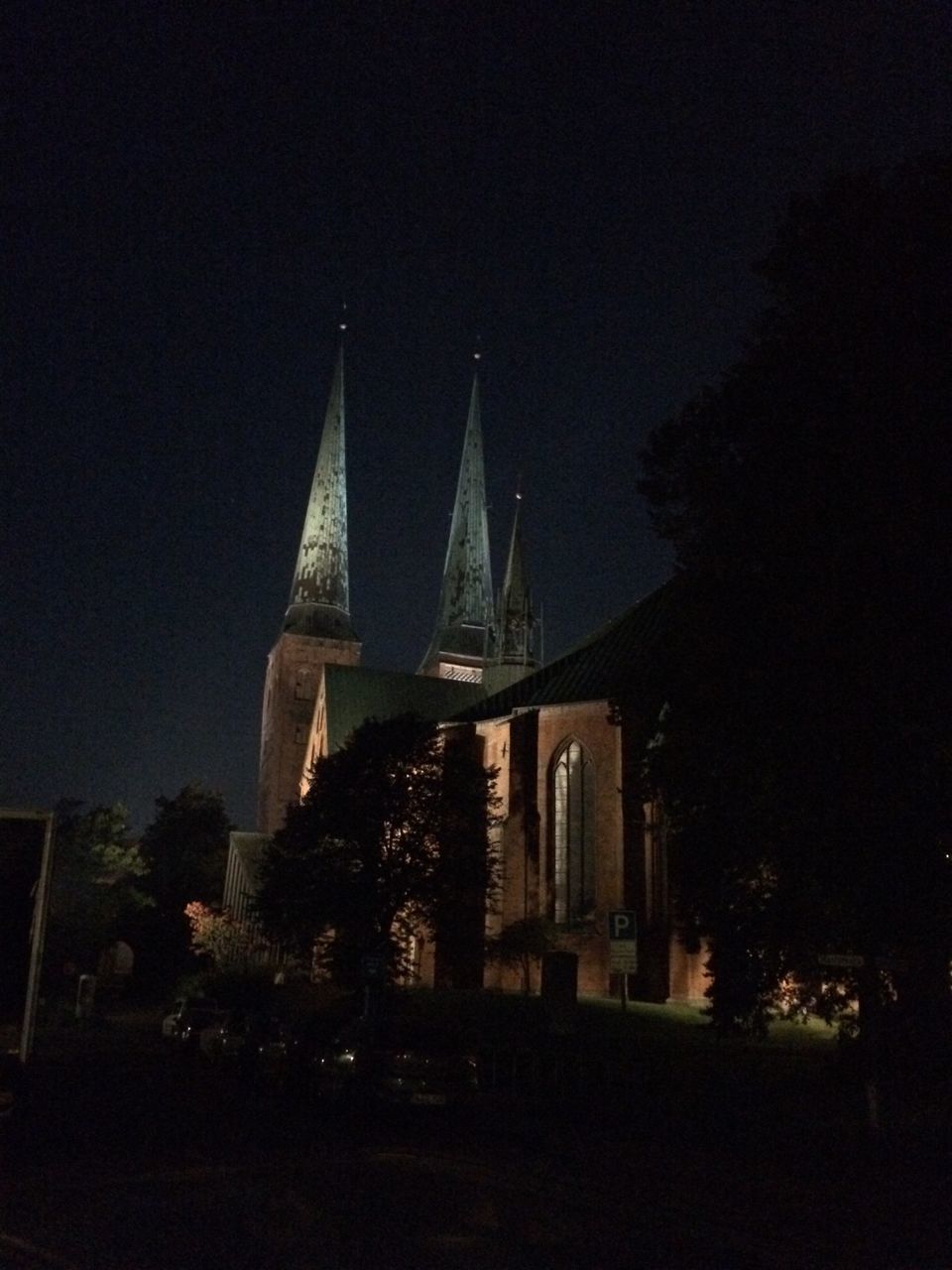 LOW ANGLE VIEW OF ILLUMINATED TEMPLE AGAINST CLEAR SKY