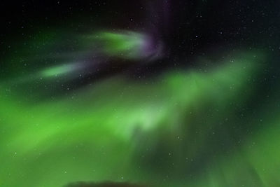 Low angle view of stars in sky at night