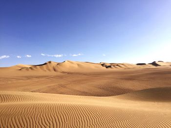 Scenic view of desert against sky