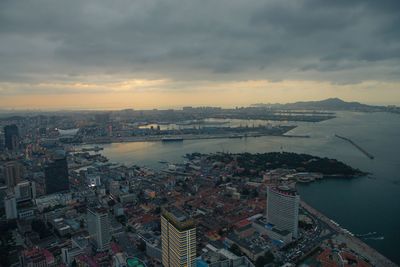 High angle view of city buildings during sunset