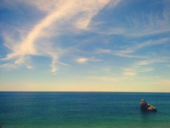 Boat sailing in sea