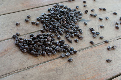 High angle view of roasted coffee beans on table