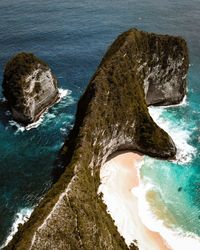 High angle view of rock formation in sea