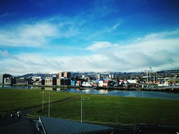 Scenic view of city against sky