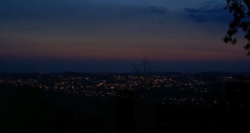 Illuminated cityscape at night