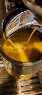 Close-up of beer glass on table