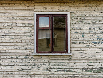 Full frame shot of window of old building