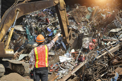 Workers in recycling factory,engineers standing in recycling center