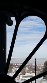 Bridge over city against sky