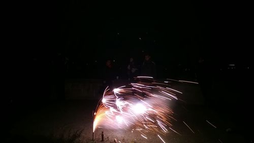 Firework display at night