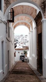 Alley amidst buildings in city