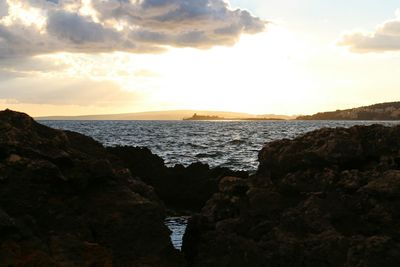 Scenic view of sea against sky during sunset