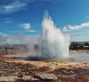 View of geyser against sky