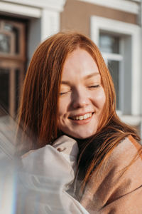 Portrait of smiling young woman