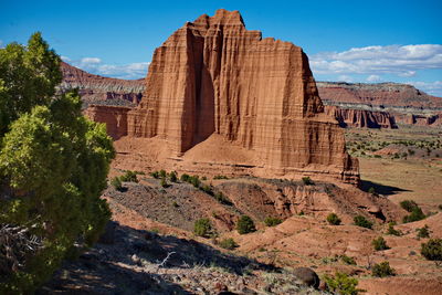 Rock formations on mountain against sky