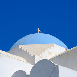 Low angle view of church against clear blue sky