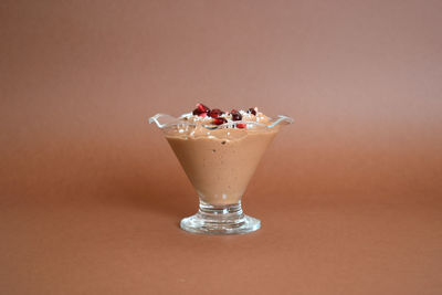 Close-up of ice cream in glass on table