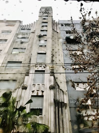 Low angle view of old building against sky