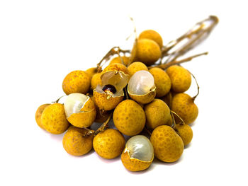 Close-up of fruits against white background