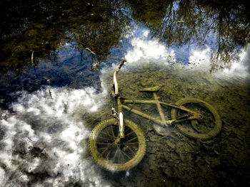 High angle view of abandoned bicycle in lake